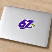 Sample mockup of a purple 67 die cut sticker applied to a silver laptop.