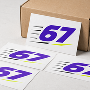 Sample mockup of purple 67 kiss cut backing cards arranged beside a kraft packaging box.